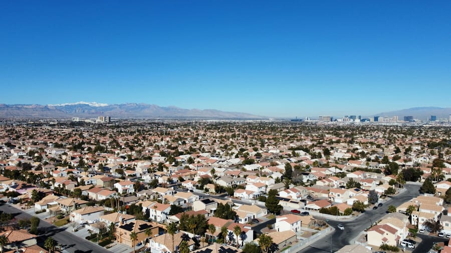 Aerial view of Spring Valley homes with the Spring Mountains behind them